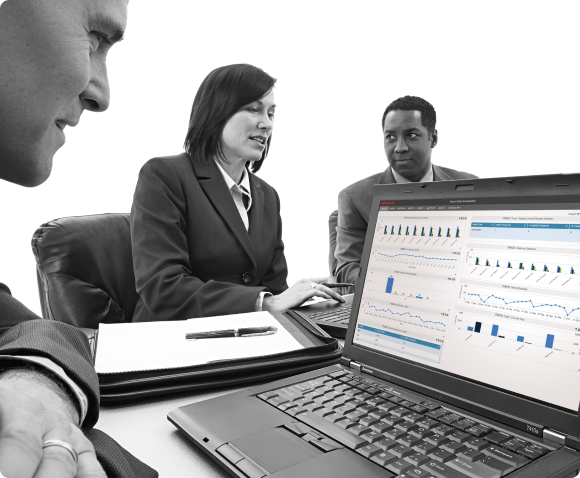 Analysts reviewing an iWAREHOUSE Gateway dashboard