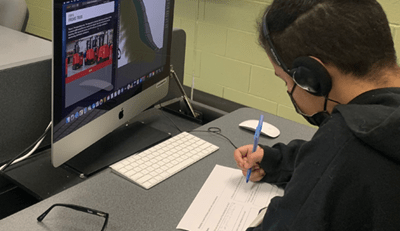 Manufacturing Day, Raymond Corp, Student watching virtual tour on a computer