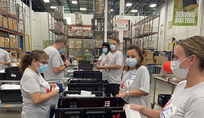 Volunteers working in a food bank