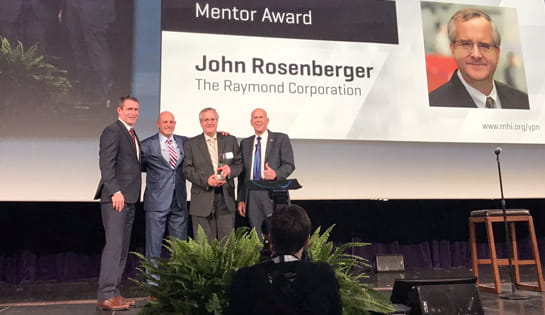 John Rosenberger receiving the MHI Mentor Award