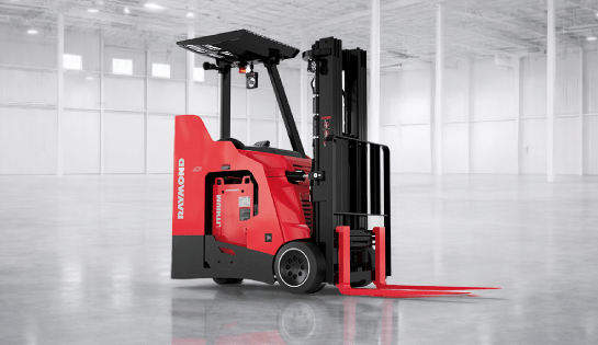 Raymond 4260 stand-up counterbalanced forklift in warehouse setting ready for pallet handling