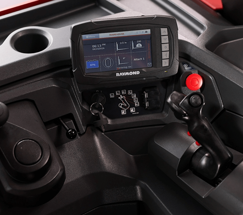 Close-up of Raymond stand-up counterbalanced forklift control panel with full-color 7-inch touchscreen display and joystick controls