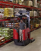 Raymond 7500 Reach-Fork Truck with Universal stance in warehouse