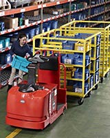 Raymond 8610 Tow Tractor in warehouse